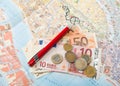 Euro money Map and red pen Royalty Free Stock Photo