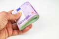 Euro money roll in hand Royalty Free Stock Photo