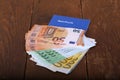 Euro money in a savings book on a table Royalty Free Stock Photo