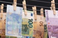 Cash Euro notes on clothesline. Money laundering on clothesline. Money Laundering euro hung out to dry. Royalty Free Stock Photo