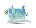 Euro notes flying around the laptop Royalty Free Stock Photo