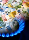 EURO notes and gas burner Royalty Free Stock Photo
