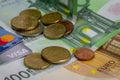 Euro paper money, coins, visa and mastercard credit cards