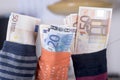 Euro savings hidden in a sock Royalty Free Stock Photo