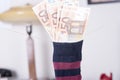 Euro savings hidden in a sock Royalty Free Stock Photo