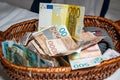 Euro and Serbian Dinar Banknotes in the basket