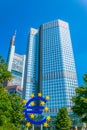 Euro sign in front of Eurotower in Frankfurt, Germany