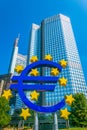 Euro sign in front of Eurotower in Frankfurt, Germany