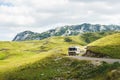 Euro-trip. Old stylish classic motorhome on the road in the mountains.