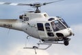 Eurocopter AS-350BA Helicopter conducting aerial filming with a nose mounted Cineflex camera over Melbourne Royalty Free Stock Photo