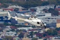 Eurocopter AS-350BA Helicopter conducting aerial filming with a nose mounted Cineflex camera over Melbourne Royalty Free Stock Photo