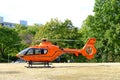 Eurocopter EC 135 D-HZSI on helipad, Orange rescue helicopter, Air medical services, German Air Ambulance, Rapid Response Vehicles