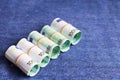 Eurocurrency rolls on a blue background Royalty Free Stock Photo