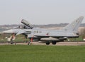 Eurofighter Typhoon rolling with errors over the air base