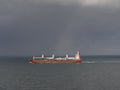 The Eurogracht Cargo Vessel transiting through the Channel with various Luxury Motor Yachts.