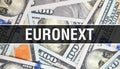 Euronext text Concept Closeup. American Dollars Cash Money,3D rendering. Euronext at Dollar Banknote. Financial USA money banknote