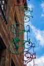 Europe, Belgium, Brussels, artwork, facade art, colorful sprayed bicycles mounted on a brick house facade Royalty Free Stock Photo