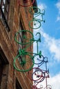 Europe, Belgium, Brussels, artwork, facade art, colorful sprayed bicycles mounted on a brick house facade Royalty Free Stock Photo