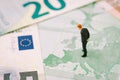 Europe, Brexit Or Britain Economy Or Financial Concept, Miniature Figure Businessman Country Leader Standing On European Map On E