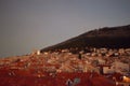 Europe, Croatia, old town Dubrovnik, sunset over rooftops with hill Sr?