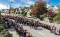 Norwegians and tourists enjoy watching annual Constitution Day parade in Stavanger city center streets