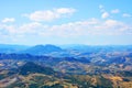 Europe,Italy landscape mountain panorama, beautiful landscape, wallpapers. Blue sky with clouds, blue distances, aerial