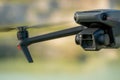 Europe, July 10, 2022: New drone DJI mavic 3 hovered in the air against the background of an industrial facility. Parts of a new