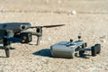 Europe, July 10, 2022: New drone DJI mavic 3 and remote control are standing on a concrete surface. Parts of a new modern