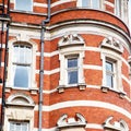 in europe london red brick wall and historical window