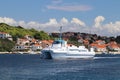 Europe. Mediterranean area. Adriatic sea. Croatia. Dalmatian seascape. Ferry-catamaran floating against the backdrop of a seaside