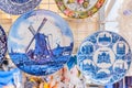 Souvenir blue and white glazed plates for sale in a Dutch market