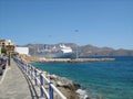 Europe, Nikolas, Greece, Crete. Ferry. Sea. Beach. Blue sky. Mountain Royalty Free Stock Photo