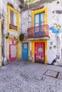 Colorful artwork on buildings in Alcobaca