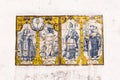Traditional hand painted azulejos tiles depicting Madonna and Child, and saints Sebastian, Marsal, and Antonio