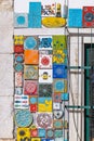 Colorfull traditional decorative tiles, known as asulejos, on a bulding in Lisbon