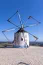 Traditional windmill in the hills of Portugal Royalty Free Stock Photo