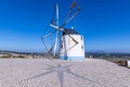 Traditional windmill in the hills of Portugal Royalty Free Stock Photo