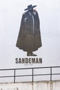 Wall mural advertisting for Sandeman, makers of port, sherry, and Brandy Royalty Free Stock Photo