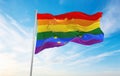 Europe rainbow gay pride flag waving in the wind at cloudy sky. Freedom and love concept. Pride month. activism, community and