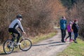 EUROPE - Slovakia, 25. May 2020: People walking and cycling, their faces covered