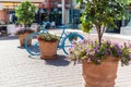 Europe street shops flowers shop day Sunny bicycles Royalty Free Stock Photo