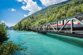 Europe train in Interlaken town over Thunersee river