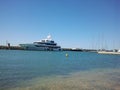 Motor luxury yacht moored on the marina of Ostia town