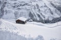 Lots of snow on it in the village warth austria with wooden barn Royalty Free Stock Photo