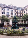 European architecture and fountain in city park in Zurich, Switzerland