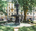 European architecture and fountain in city park in Zurich, Switzerland