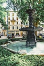 European architecture and fountain in city park in Zurich, Switzerland