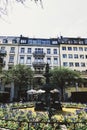 European architecture and fountain in city park in Zurich, Switzerland