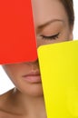 European beautiful woman with red and yellow card Royalty Free Stock Photo