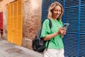 European blonde woman smiling have chat on phone